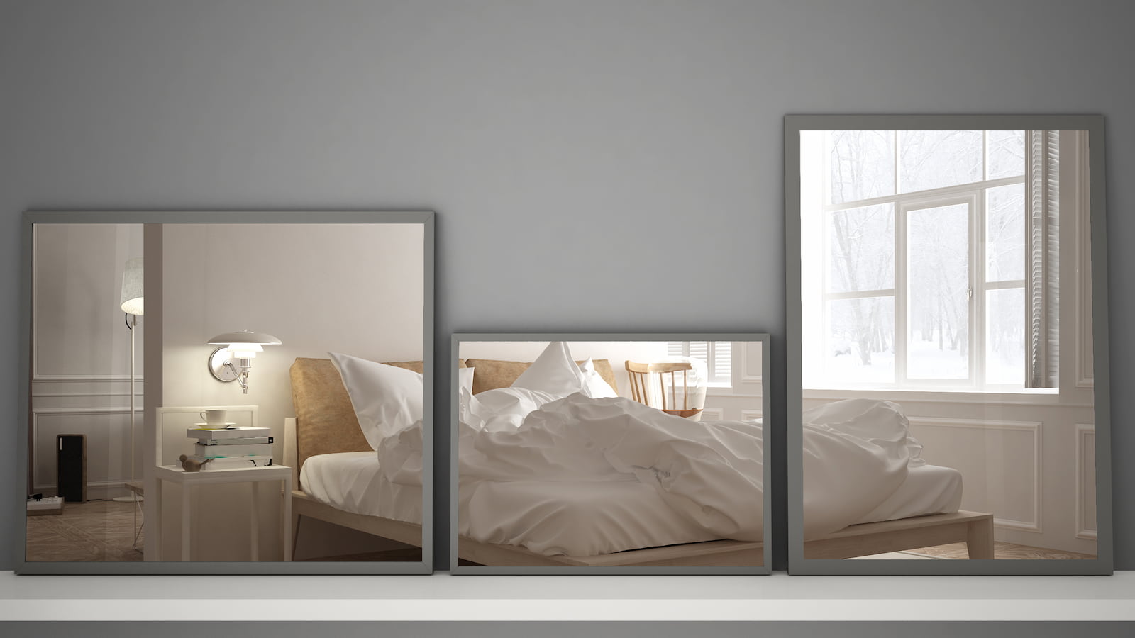 three mirrors reflect white bed and bedroom